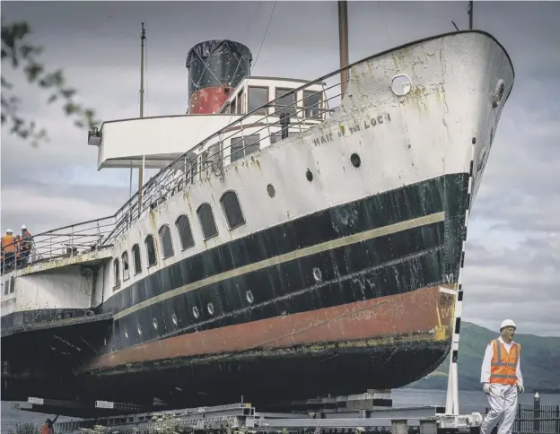  ??  ?? 0 The historic Loch Lomond paddle steamer was finally brought ashore yesterday.