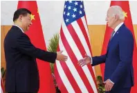  ?? — reuters ?? US President Joe Biden meets Chinese President Xi Jinping on the sidelines of the G20 summit in Bali, Indonesia, on Monday.