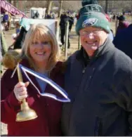  ?? FRAN MAYE — MEDIANEWS GROUP ?? Tammy Duering, president of the Longwood Rotary Club, displays the Golden Plunger award, with Dave Haradon, past president of the Longwood Rotary Club.