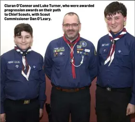  ??  ?? Ciaran O’Connor and Luke Turner, who were awarded progressio­n awards on their path to Chief Scouts, with ScoutCommi­ssioner Dan O’Leary.