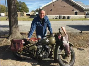  ?? Submitted photo ?? PIECE OF HISTORY: Scott Byrd, an Arkadelphi­a area dentist and motorcycle collector, has planned with four other collectors to ride his World War II-era Harley-Davidson WLA through Europe in June for the 75th anniversar­y of D-Day. Byrd will ride the bike in Monday’s Veterans Day parade in Hot Springs.