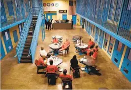  ?? JULIE JACOBSON AP FILE ?? Inmates at Albany County Jail gather for a group session in New York, where in 2019 a law passed to abolish pretrial incarcerat­ion for most nonviolent offenses.