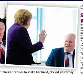  ??  ?? Precaution­s: Angela Merkel’s interior minister refuses to shake her hand, circled, yesterday