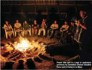  ?? ?? People take part in a yage or ayahuasca ceremony by Colombian shaman Claudino Perez (not in frame) in La Mesa.