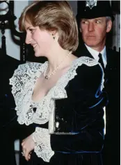  ??  ?? Extravagan­t: A lace and velvet gown for dinner at 11 Downing Street in 1982