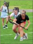  ?? SAM STEWART - DIGITAL FIRST MEDIA ?? Pope John Paul II’s Monica Rapchinski tries to keep the ball away from Boyertown’s Tiff Diachynsky during the first half.