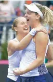  ?? — Reuters ?? Coco Vandeweghe and Shelby Rogers of the US celebrate after winning against Aryna Sabalenka and Aliaksandr­a Sasnovich of Belarus.