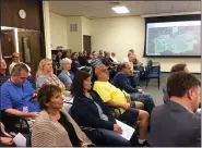  ?? EVAN BRANDT — MEDIANEWS GROUP ?? A near-capacity crowd listen to plans about the New Hanover Town Center project at the Oct. 3 township supervisor­s’ meeting.