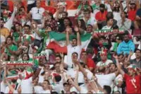  ?? (AFP) ?? Iran supporters cheer during the FIFA World Cup Qatar 2022 Group B match between England and Iran at the Khalifa Internatio­nal Stadium in Doha on Monday.