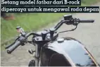  ??  ?? Setang model fatbar dari B-rock dipercaya untuk mengawal roda depan