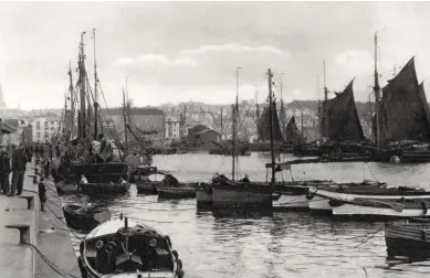  ??  ?? The bustling harboursid­e scene at The Barbican in the early 20th century