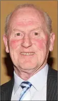  ??  ?? The late Tom ‘Flash’ Dunne pictured on the night in 2010 when he was named on the Wexford Football League’s 50th anniversar­y legends team.