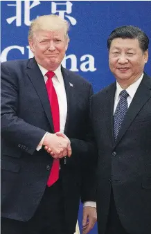  ?? NICOLAS ASFOURI/AFP/GETTY IMAGES FILES ?? U.S. President Donald Trump may have already lost to Chinese President Xi Jinping, says Joe Chidley.