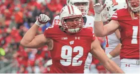  ?? MARK HOFFMAN, MILWAUKEE JOURNAL SENTINEL ?? Matt Henningsen and players returning from injuries give the Badgers three strong options at defensive end.