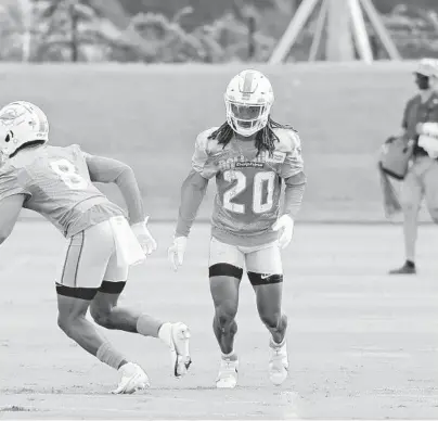  ?? AMY BETH BENNETT/SOUTH FLORIDA SUN SENTINEL ?? Dolphins safety Sheldrick Redwine (20) is shown during practice last week.