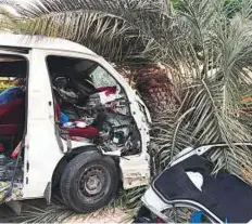  ?? Courtesy: Dubai Police ?? The van that rammed the tree on Zabeel Road in the early hours yesterday. Dubai Police said the driver lost control and the van swerved and crashed into the roadside tree.