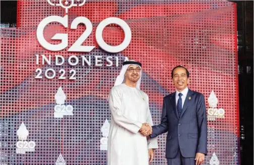  ?? WAM ?? Sheikh Mohamed Bin Zayed greets Joko ± Widodo at G20 Leaders’ Summit in Bali, Indonesia, on Tuesday.