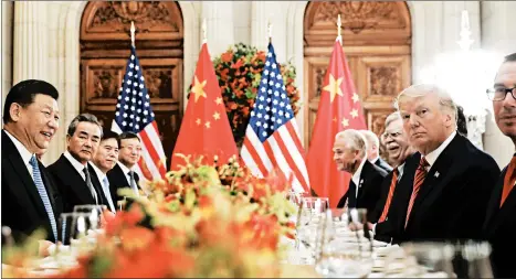  ?? PABLO MARTINEZ MONSIVAIS/AP ?? Chinese leader Xi Jinping, left, and President Donald Trump’s dinner came amid a trade dispute between the two nations.