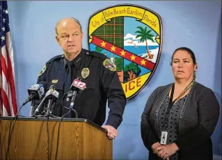  ?? ALLEN EYESTONE / THE PALM BEACH POST ?? Palm Beach Gardens interim chief of police Clint Shannon and lead investigat­or Jennifer Brashear address the media Tuesday about the fatal stabbing in BallenIsle­s Country Club. Shannon said Corey Johnson had been investigat­ed for “alleged violent...