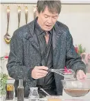  ??  ?? Cooking…Sir Cliff loves his sauce