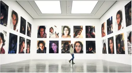  ?? Photo: AP ?? A visitor walks around Emin’s Insomnia Room installati­on at the White Cube in London.