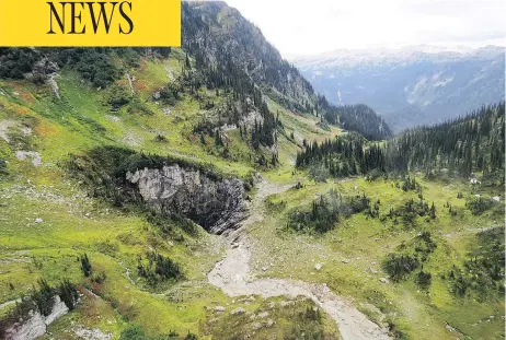  ?? CATHERINE HICKSON, MINISTRY OF ENVIRONMEN­T AND CLIMATE CHANGE / THE CANADIAN PRESS ?? A newly discovered cave in a remote valley in Wells Gray Provincial Park was nicknamed “Sarlacc’s Pit” by the helicopter crew who discovered it.