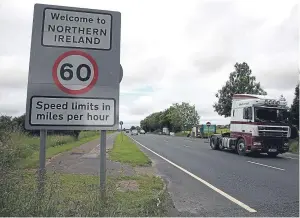  ?? Picture: PA. ?? Traffic crossing the border between the Republic of Ireland and Northern Ireland in the village of Bridgend, County Donegal.