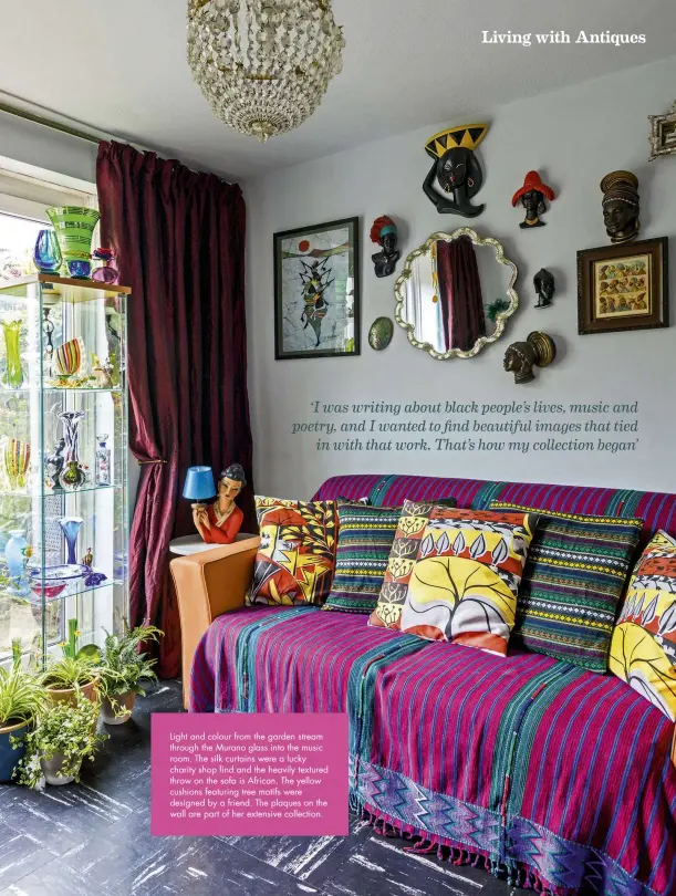  ??  ?? Light and colour from the garden stream through the Murano glass into the music room. The silk curtains were a lucky charity shop find and the heavily textured throw on the sofa is African. The yellow cushions featuring tree motifs were designed by a friend. The plaques on the wall are part of her extensive collection.