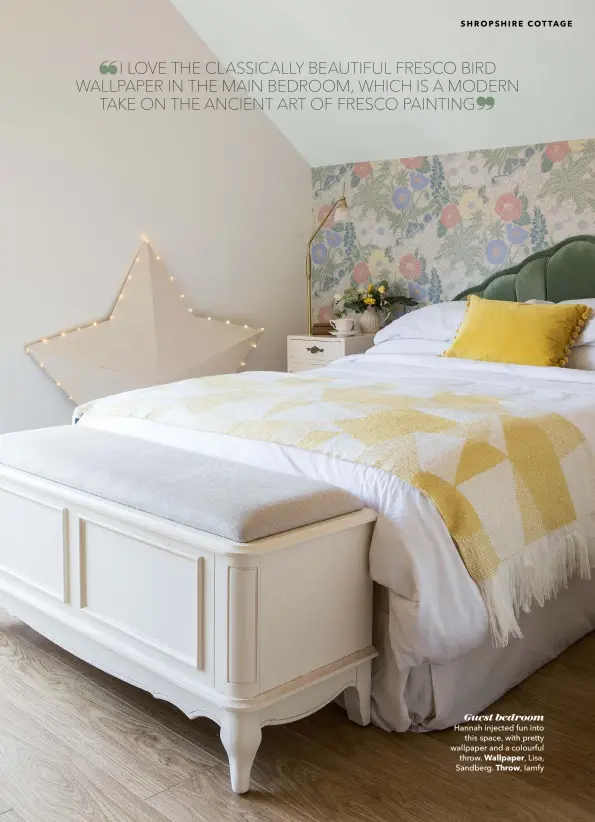  ??  ?? Guest bedroom Hannah injected fun into this space, with pretty wallpaper and a colourful throw. Wallpaper, Lisa, Sandberg. Throw, Iamfy