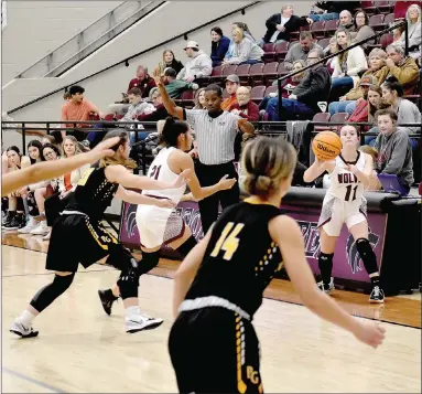  ?? MARK HUMPHREY ENTERPRISE-LEADER ?? Lincoln’s Saylor Stidham found in-bounding difficult against Prairie Grove’s tenacious man-to-man defense. The Lady Tigers knocked off the Lady Wolves, 70-35, on Tuesday, Dec. 7, 2021, in a nonconfere­nce girls basketball game at Wolfpack Arena.