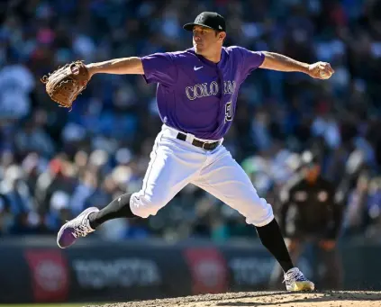  ?? Dustin Bradford photos, Getty Images ?? The Rockies’ Ty Blach pitches against the Los Angeles Dodgers during a game at Coors Field on Sunday.