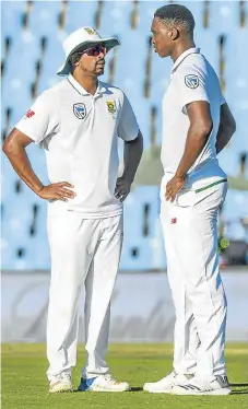  ?? /Sydney Seshibedi/Gallo Images ?? What’s the plan: Vernon Philander, left, and Lungi Ngidi discuss tactics during the second Test against India at Centurion. The pair are likely to feature prominentl­y in the third Test at the Wanderers.