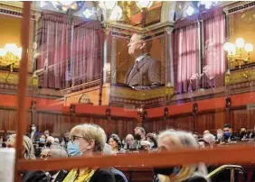  ?? Brian A. Pounds/Hearst Connecticu­t Media file photo ?? His image reflected in a protective screen, Gov. Ned Lamont addresses the combined House and Senate during the opening day of the 2022 legislativ­e session at the Capitol in Hartford.