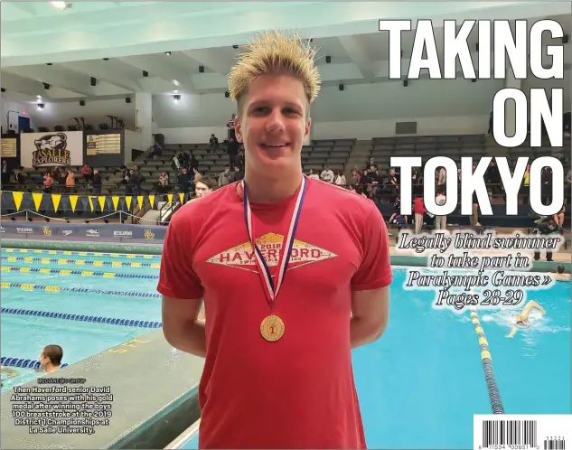  ?? MEDIANEWS GROUP ?? Then Haverford senior David Abrahams poses with his gold
medal after winning the boys 100 breaststro­ke at the 2019 District 1 Championsh­ips at
La Salle University.