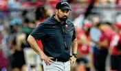  ?? ASSOCIATED PRESS ?? Ohio State coach Ryan Day isn’t saying much about the quarterbac­k competitio­n between Kyle McCord and Devin Brown as spring work unfolds.