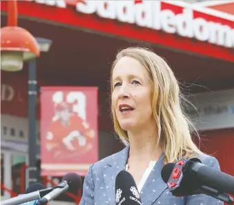  ?? GAVIN YOUNG ?? Kate Thompson, Calgary Municipal Land Corporatio­n president and CEO, announces the team who will lead the design and constructi­on of the $550 million event centre that will replace the Saddledome.