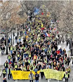  ??  ?? President Macron has been forced into more concession­s by Gilets Jaunes protesters