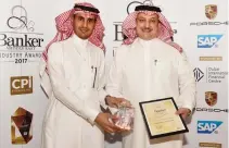  ??  ?? From left, Ahmed Al-Faifi, managing director of SAP Saudi Arabia, gives the Banker Middle East Award for ‘Best Implementa­tion’ to Mohammed Al-Baghdadi, CIO, IDB.