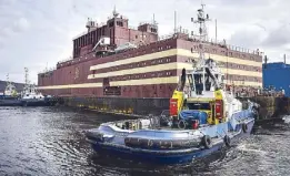  ?? AFP ?? Floating power unit Akademik Lomonossov is towed to Atomflot moorage in Murmansk, Russia on Saturday.