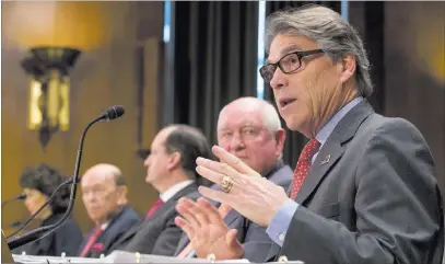  ?? Andrew Harnik ?? The Associated Press Energy Secretary Rick Perry, far right, said Wednesday he had no interest in taking charge of the Department of Veterans Affairs.