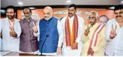  ?? PTI ?? BJP national president Amit Shah with Telangana Party President DR Lakshman and others pose for photos after a press conference in Hyderabad on Saturday