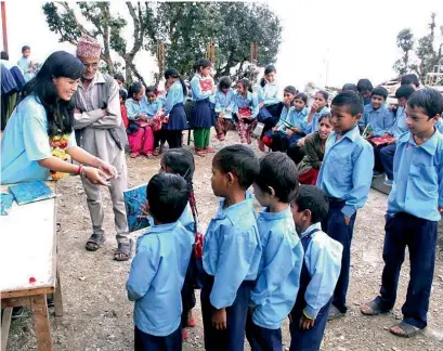  ?? Supplied photos ?? Asim Rai began his storybook donation to the lost children of Nepal in an effort to help their education. —