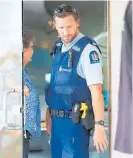  ?? Photo / John Stone ?? Police investigat­e the armed robbery at ANZ in Whanga¯ rei in which Junior Mau was the getaway driver to his half-brother and another person.