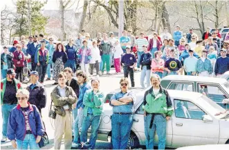  ?? CAPE BRETON POST FILE ?? A crowd of about 100 people waited outside the Sydney Courthouse on May 21, 1992, for the arraignmen­t of Darren Muise, Derek Wood and Freeman Macneil who were later convicted of murder and robbery.