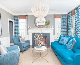  ?? Bryan Haeffele ?? Out of the blue: Interior designer Jennifer Coleman of Ridgefield- based JKC Designs combined color and pattern in this warm and inviting family room.