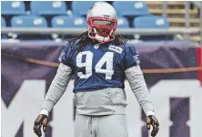  ?? STAFF PHOTO BY JOHN WILCOX ?? A LOT ON THE LINE: Ricky Jean Francois warms up yesterday at Gillette Stadium as the Patriots prepare to face the Jaguars in the AFC Championsh­ip Game.