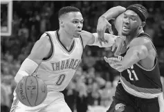  ??  ?? Oklahoma City Thunder’s Russell Westbrook drives to the basket in front of Portland Trail Blazers’ Noah Vonleh during the first quarter at Chesapeake Energy Arena, Oklahoma. — USA TODAY Sports photo