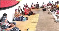  ?? ?? First Lady Auxillia Mnangagwa and Minister of State and Devolution Affairs Nokuthula Matsikenye­ri interact with victims of child marriages in Chipinge on Friday