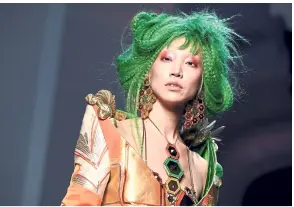  ??  ?? Emerald hair at Jean-Paul Gaultier, one of the rainbow of shades seen at the Haute Couture show. — Photos: AFP