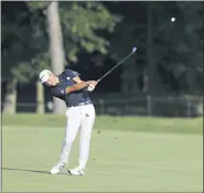  ?? DARRON CUMMINGS — THE ASSOCIATED PRESS ?? Coilin Morikawa hits on the 13th hole during the second round of the Workday Charity Open on Friday in Dublin, Ohio.